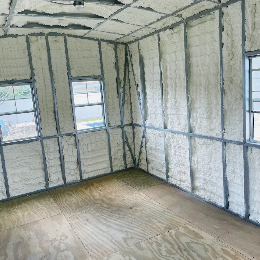 Closed-cell spray foam insulation applied to wall cavities in a residential project in Aliquippa